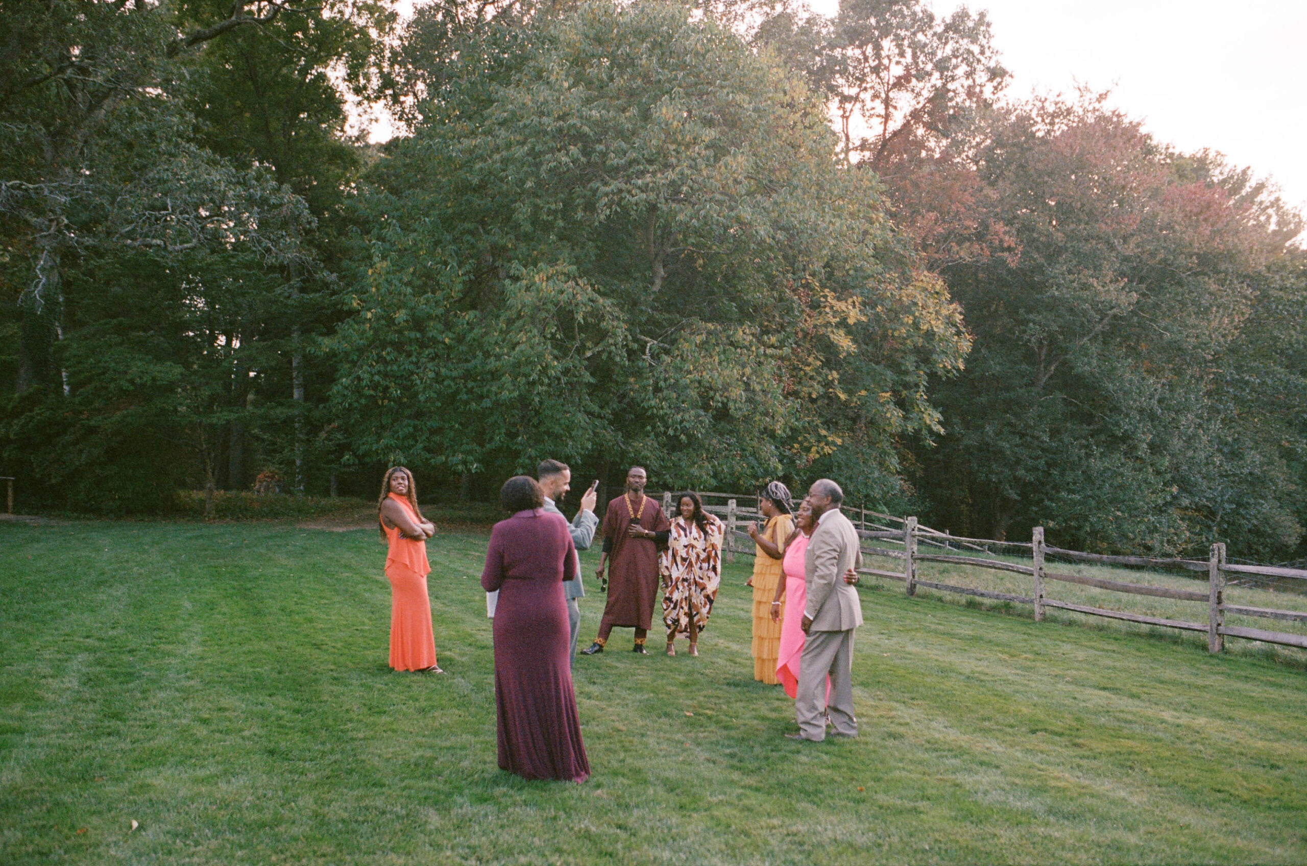 guests mingle at cocktail hour at the bradley estate in canton massachusetts at a wedding on film